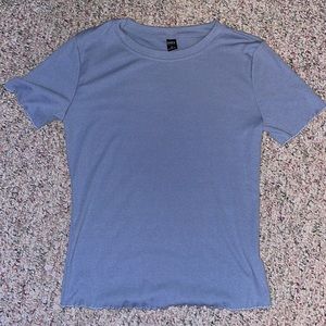 Blue tee shirt never worn. Not sure where I got it from.